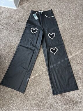 Black Wide-Leg Jeans with Heart Appliqué Trim